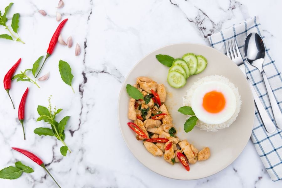 Basil chicken with jasmine rice and fried egg