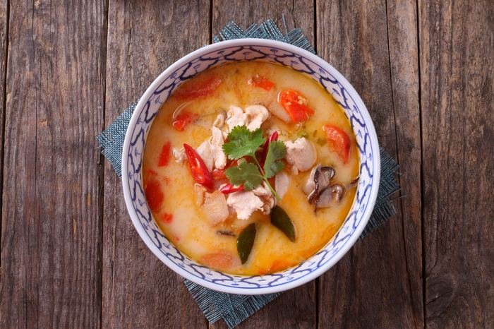 Tom Yum soup in a patterned bowl